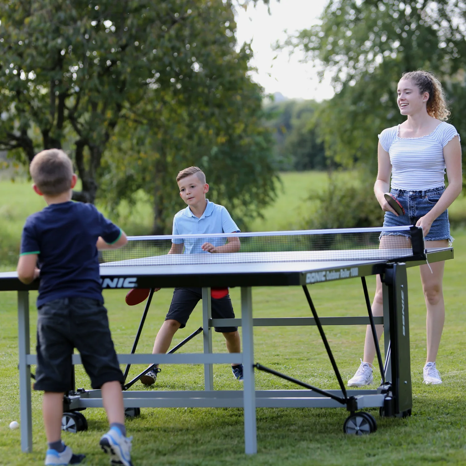 Реальное фото Теннисный стол DONIC OUTDOOR ROLLER 1000 GREEN 230291-G от магазина Спортев