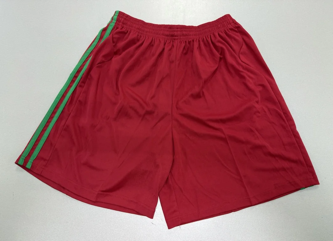 Реальное фото Форма футбольная Leader Team взр. green/red MX-07H от магазина Спортев