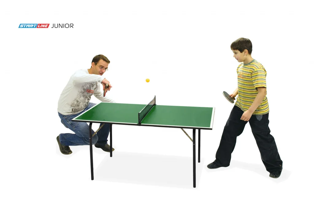 Реальное фото Стол теннисный Junior Зелёный с сеткой от магазина Спортев