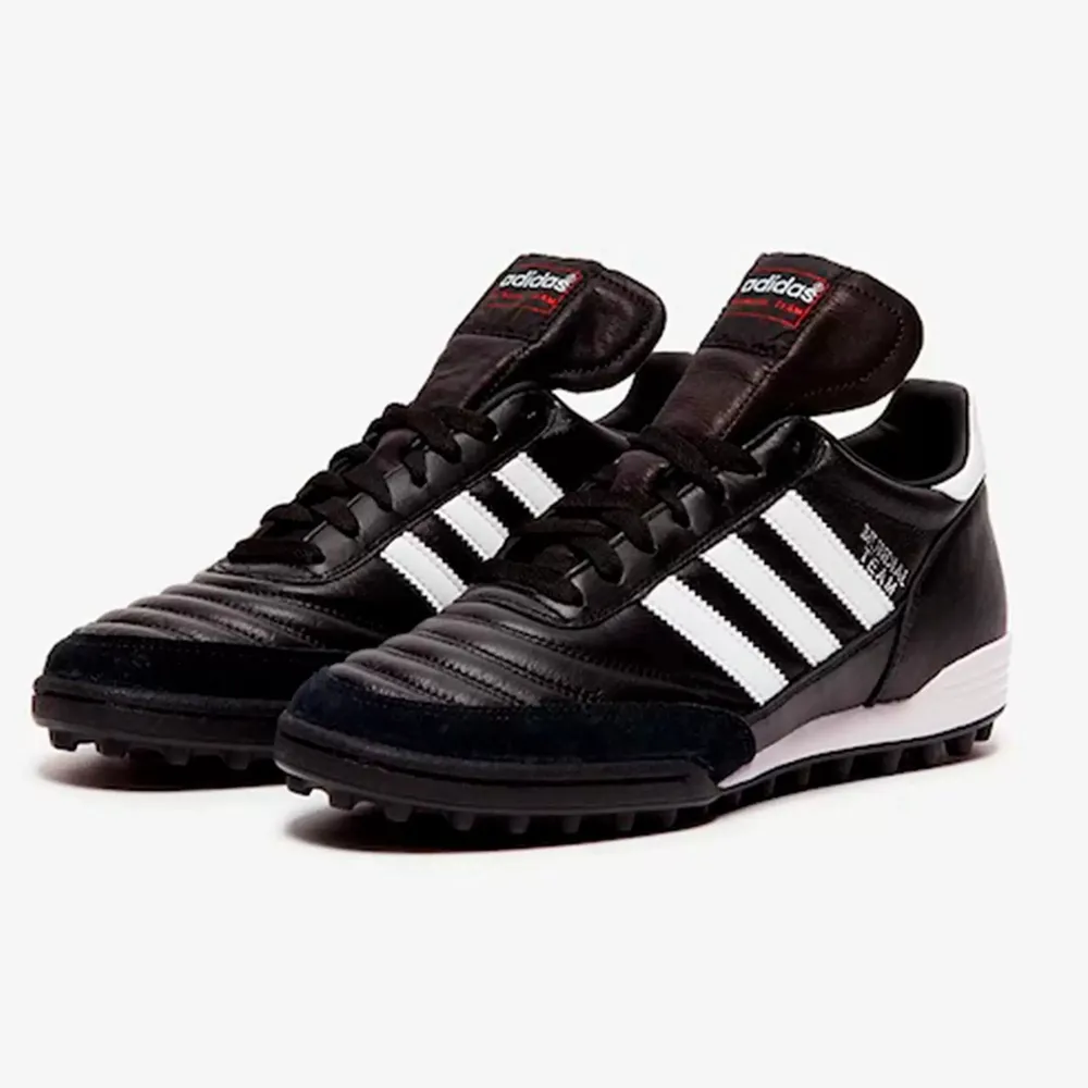 Реальное фото Бутсы Adidas Mundial Team TF New 019228 от магазина Спортев